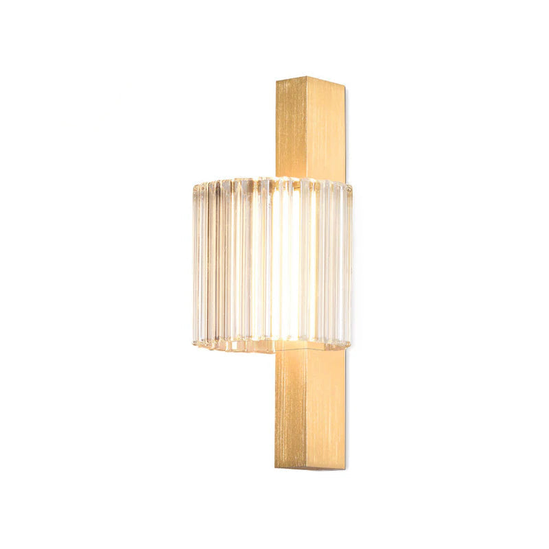 Modern wall sconce with gold finish and clear glass on a white background, featuring a 'NEW' label.