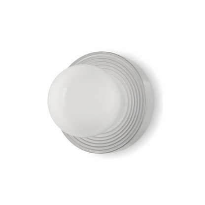 White ceramic plate with decorative rim on a white background